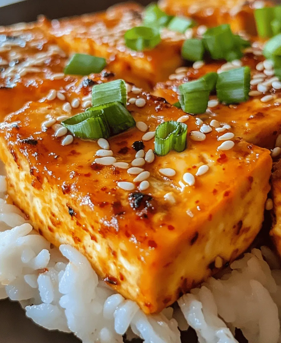 Korean cuisine is renowned for its vibrant flavors, colorful presentations, and a harmony of textures that captivates the senses. Central to this culinary tradition is the use of bold ingredients that pack a flavorful punch, and one dish that exemplifies this is <strong></noscript>Crispy Gochujang Korean Tofu. This recipe not only showcases the” /></p>
<p></p>
<h3>Step-by-Step Guide to Frying Tofu for Optimal Crispiness</h3>
<p></p>
<p>Achieving the perfect crispy tofu is all about the technique. Start with firm or extra-firm tofu, as it holds up better during cooking and won’t break apart as easily. Follow these steps to fry your tofu to golden perfection:</p>
<p></p>
<p>1. <strong>Press the Tofu</strong>: Begin by draining the tofu and wrapping it in a clean kitchen towel or paper towels. Place a heavy object, like a cast-iron skillet or a few cookbooks, on top to press out excess moisture. This step is crucial; the drier the tofu, the crispier it will be once fried. Allow it to press for at least 30 minutes.</p>
<p></p>
<p>2. <strong>Cut the Tofu</strong>: Once pressed, slice the tofu into even cubes or rectangles, about 1-inch thick. Uniformity in size ensures that the tofu cooks evenly.</p>
<p></p>
<p>3. <strong>Coat the Tofu</strong>: For an extra layer of crunch, you can toss the tofu in cornstarch or a mixture of cornstarch and flour. This step creates a crispy exterior that crisps up beautifully during frying.</p>
<p></p>
<p>4. <strong>Heat the Oil</strong>: In a large skillet, heat about 1/4 cup of vegetable oil over medium-high heat. The oil should be hot but not smoking. You can test the temperature by dropping a small piece of tofu into the oil; it should sizzle immediately.</p>
<p></p>
<p>5. <strong>Add the Tofu</strong>: Carefully place the tofu pieces in the hot oil, ensuring they are not overcrowded. Fry in batches if necessary, as overcrowding can lead to steaming rather than frying.</p>
<p></p>
<p>6. <strong>Fry Until Golden</strong>: Cook the tofu for about 3-4 minutes on each side, or until golden brown and crispy. Use a slotted spatula to flip the tofu gently, ensuring you don’t break the pieces.</p>
<p></p>
<h3>Techniques for Flipping Tofu Without Breaking It</h3>
<p></p>
<p>To flip tofu without breaking it, follow these key techniques:</p>
<p></p>
<p>– <strong>Use a Non-Stick or Cast Iron Skillet</strong>: These types of pans allow for easier flipping without sticking.</p>
<p></p>
<p>– <strong>Let it Cook</strong>: Allow the tofu to cook undisturbed on one side until golden brown. This ensures that it forms a crust that will hold together when flipped.</p>
<p></p>
<p>– <strong>Use a Spatula</strong>: A wide spatula can help you lift the tofu gently from underneath. Slide it underneath the tofu and carefully flip it over, ensuring that the spatula supports the entire piece.</p>
<p></p>
<p>– <strong>Flip in Batches</strong>: If frying a large amount of tofu, consider working in smaller batches to maintain control over each piece.</p>
<p></p>
<h3>Creating the Gochujang Sauce</h3>
<p></p>
<p>The gochujang sauce is the star of this dish, adding a rich, complex flavor that perfectly complements the crispy tofu. Let’s break down the key ingredients:</p>
<p></p>
<p>– <strong>Gochujang</strong>: This Korean chili paste is fermented and comes with a unique umami flavor. It provides the dish with its signature heat and depth.</p>
<p></p>
<p>– <strong>Soy Sauce</strong>: Adds saltiness and enhances the savory notes of the dish. Use low-sodium soy sauce if you are watching your salt intake.</p>
<p></p>
<p>– <strong>Maple Syrup or Honey</strong>: This ingredient balances the heat of the gochujang, adding a touch of sweetness. For a vegan option, stick to maple syrup.</p>
<p></p>
<p>– <strong>Rice Vinegar</strong>: It brings a tangy brightness to the sauce, cutting through the richness of the tofu and other ingredients.</p>
<p></p>
<p>– <strong>Sesame Oil</strong>: This adds a nutty aroma and flavor, enhancing the overall taste of the sauce.</p>
<p></p>
<p>– <strong>Garlic and Ginger</strong>: Freshly minced garlic and ginger contribute aromatic warmth, enhancing the depth of flavor.</p>
<p></p>
<h4>Importance of Balancing Flavors: Sweet, Spicy, Savory, and Tangy</h4>
<p></p>
<p>When creating your gochujang sauce, balancing these flavors is essential. Taste as you go, adjusting ingredients to your preference. The goal is to achieve a harmonious blend where no single flavor overpowers the others. For example, if the sauce feels too spicy, a little more maple syrup can help to counterbalance that heat.</p>
<p></p>
<h4>Tips for Adjusting the Spice Level According to Personal Preference</h4>
<p></p>
<p>– <strong>Start Small</strong>: When adding gochujang, start with a smaller amount and gradually increase it until you reach your desired spice level.</p>
<p></p>
<p>– <strong>Add Acidity</strong>: If the sauce is too spicy, adding a splash more rice vinegar can help to tone down the heat.</p>
<p></p>
<p>– <strong>Serve with Cooling Ingredients</strong>: Pairing your dish with cooling sides like cucumber salad or yogurt can help balance the overall heat.</p>
<p></p>
<h3>Final Cooking Steps: Glazing and Serving</h3>
<p></p>
<p>Once your tofu is crispy and your sauce is ready, it’s time to combine the two.</p>
<p></p>
<h4>Techniques for Glazing Tofu Without Losing Its Crispy Texture</h4>
<p></p>
<p>1. <strong>Lower the Heat</strong>: After frying, lower the skillet’s heat to medium-low before adding the sauce. This prevents the sauce from burning and allows it to coat the tofu evenly.</p>
<p></p>
<p>2. <strong>Add the Sauce Gradually</strong>: Pour the gochujang sauce over the tofu in the skillet. Gently toss the tofu in the sauce, ensuring that each piece is coated without breaking the crispy crust.</p>
<p></p>
<p>3. <strong>Let It Thicken</strong>: Allow the sauce to simmer for a few minutes. This will help it thicken and caramelize slightly, creating a delicious glaze that clings to the tofu without making it soggy.</p>
<p></p>
<h3>Serving Suggestions: Pairing with Rice or Noodles, Garnishing Options</h3>
<p></p>
<p>Crispy gochujang tofu is incredibly versatile and can be served in various ways:</p>
<p></p>
<p>– <strong>With Rice</strong>: Serve the glazed tofu over a bed of steamed white or brown rice. The rice absorbs the delicious sauce, making every bite flavorful.</p>
<p></p>
<p>– <strong>With Noodles</strong>: Alternatively, toss the tofu with cooked noodles (like soba or rice noodles) and fresh vegetables for a more filling meal.</p>
<p></p>
<p>– <strong>Garnishing Options</strong>: Top with sliced green onions, sesame seeds, or chopped cilantro for added freshness and a pop of color.</p>
<p></p>
<h3>Health Benefits of Crispy Gochujang Tofu</h3>
<p></p>
<p>Crispy gochujang tofu is not just delicious; it also offers several health benefits.</p>
<p></p>
<h4>Overview of the Health Benefits of the Ingredients Used</h4>
<p></p>
<p>– <strong>Tofu</strong>: A great source of plant-based protein, tofu is low in calories and high in essential amino acids. It also contains calcium and iron, making it an excellent choice for those on a vegan diet.</p>
<p></p>
<p>– <strong>Gochujang</strong>: This chili paste is rich in vitamins and antioxidants, and it may promote metabolism due to its capsaicin content.</p>
<p></p>
<p>– <strong>Vegetables</strong>: Incorporating vegetables into the dish adds fiber, vitamins, and minerals, enhancing the nutritional profile.</p>
<p></p>
<h4>How This Dish Fits into a Balanced Diet</h4>
<p></p>
<p>Crispy gochujang tofu can be part of a balanced diet when paired with whole grains and vegetables. This dish provides a good balance of macronutrients—protein from tofu, carbohydrates from rice or noodles, and healthy fats from sesame oil.</p>
<p></p>
<h4>Addressing Common Dietary Concerns: Vegan, Gluten-Free Options</h4>
<p></p>
<p>This recipe is inherently vegan and can easily be adapted to gluten-free diets by using tamari instead of soy sauce. Ensuring that your gochujang is gluten-free is also important for those with gluten sensitivities.</p>
<p></p>
<h3>Culinary Variations and Adaptations</h3>
<p></p>
<p>Crispy gochujang tofu can be customized in various ways to suit different taste preferences and dietary needs.</p>
<p></p>
<h4>Suggestions for Ingredient Substitutions Based on Dietary Restrictions</h4>
<p></p>
<p>– <strong>Tofu Alternatives</strong>: For those who aren’t fans of tofu or have soy allergies, consider using tempeh or seitan.</p>
<p></p>
<p>– <strong>Sweetener Variations</strong>: If you prefer not to use maple syrup or honey, agave nectar or coconut sugar can be good alternatives.</p>
<p></p>
<h4>Ideas for Adding Vegetables to the Dish for Enhanced Nutrition and Flavor</h4>
<p></p>
<p>Incorporate colorful vegetables such as bell peppers, broccoli, or snap peas. Simply stir-fry them in the same pan after cooking the tofu, then toss them with the glazed tofu for added texture and nutrition.</p>
<p></p>
<h4>Exploring International Adaptations of Gochujang Tofu</h4>
<p></p>
<p>– <strong>Japanese Style</strong>: Try adding miso paste to the sauce for a Japanese twist, or serve with soba noodles.</p>
<p></p>
<p>– <strong>Thai Influence</strong>: Mix in some coconut milk and lime juice to create a creamy, tangy sauce reminiscent of Thai curries.</p>
<p></p>
<h3>Conclusion</h3>
<p></p>
<p>Crispy gochujang tofu is a delightful dish that combines simplicity and healthiness with incredible flavor. The crispy texture of the tofu paired with the bold, spicy-sweet gochujang sauce creates a satisfying meal that is perfect for any occasion. Whether you’re looking for a quick weeknight dinner or a dish to impress guests, this recipe is sure to deliver.</p>
<p></p>
<p>Don’t hesitate to try making this dish at home! The versatility of gochujang and tofu allows for endless culinary creativity, ensuring that each time you prepare it, you can customize it to suit your taste. Enjoy the process, experiment with flavors, and savor the delicious results.</p>
<div id=